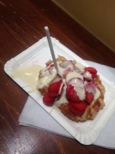 Belgian waffle with white chocolate and strawberries